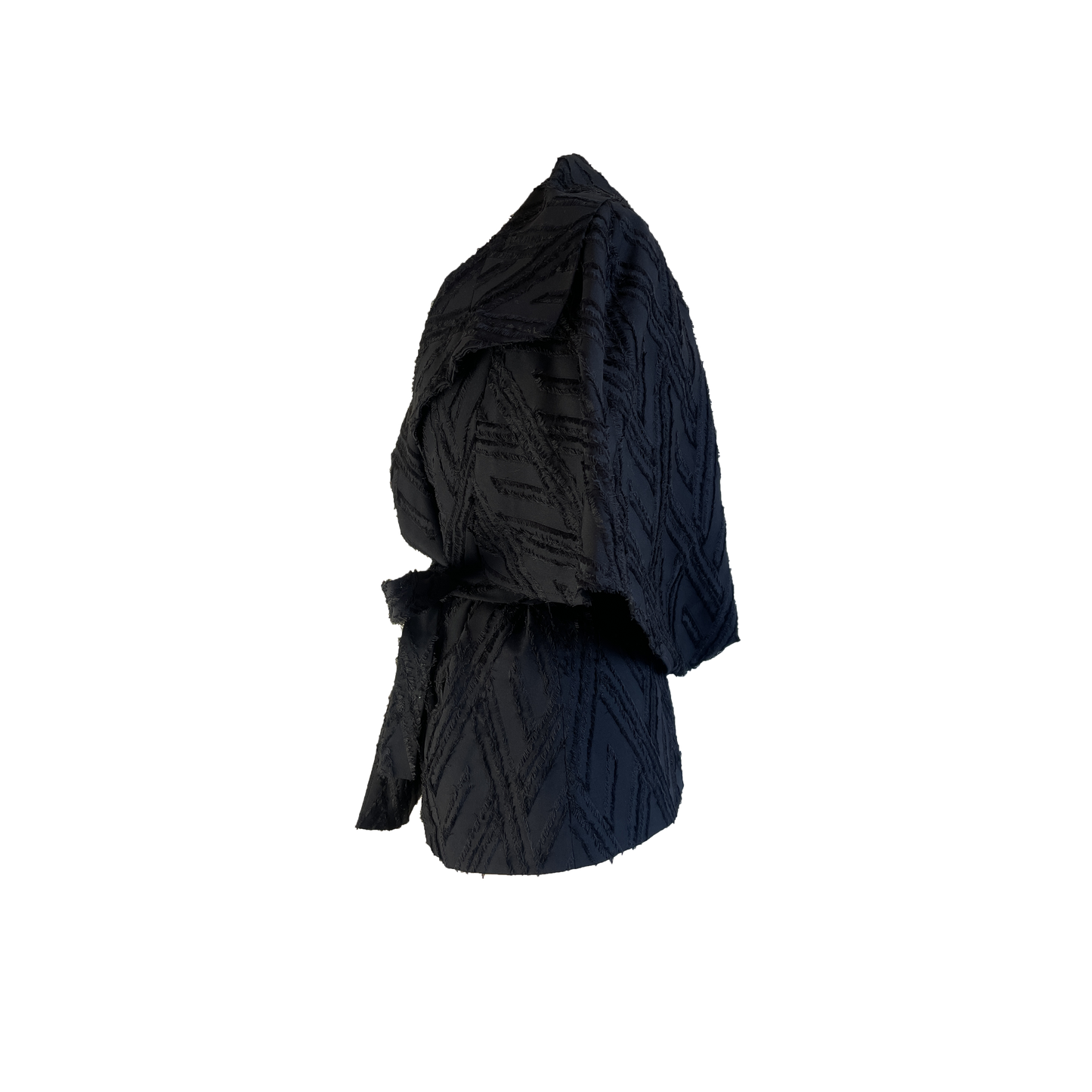 Side of black wool blend wrap jacket with transformable cape with black fringed detail