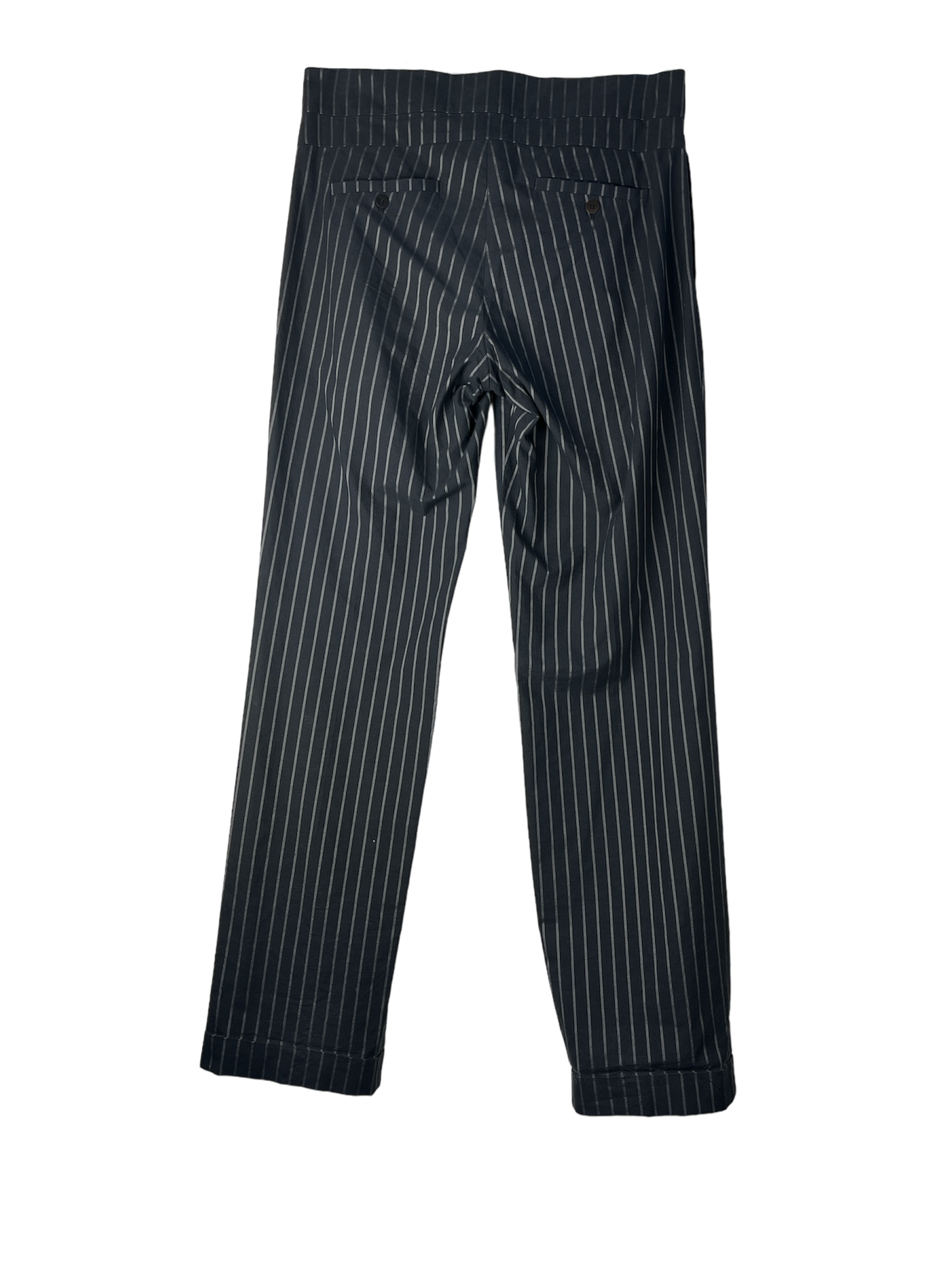 Back of black pants with folded legs in black and white striped color