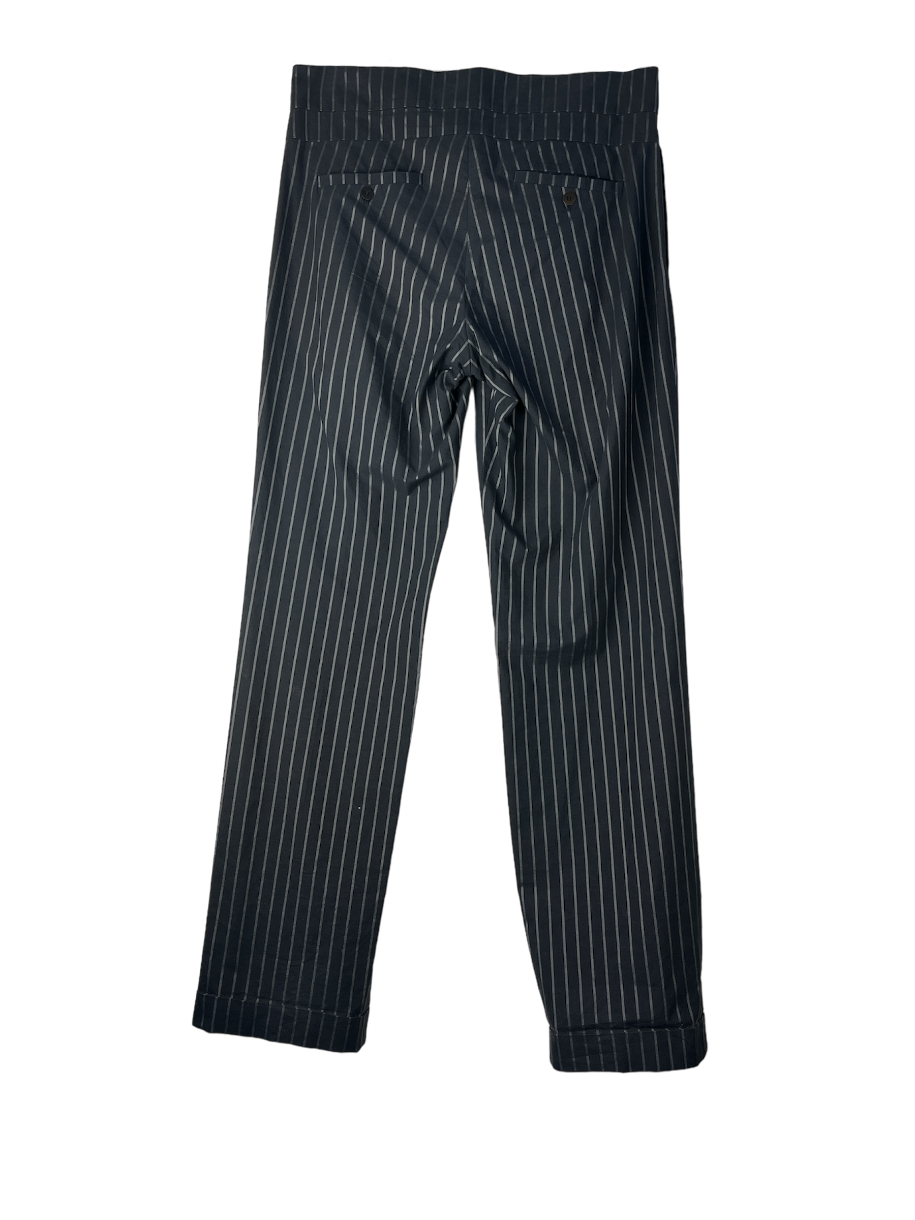 Back of black pants with folded legs in black and white striped color