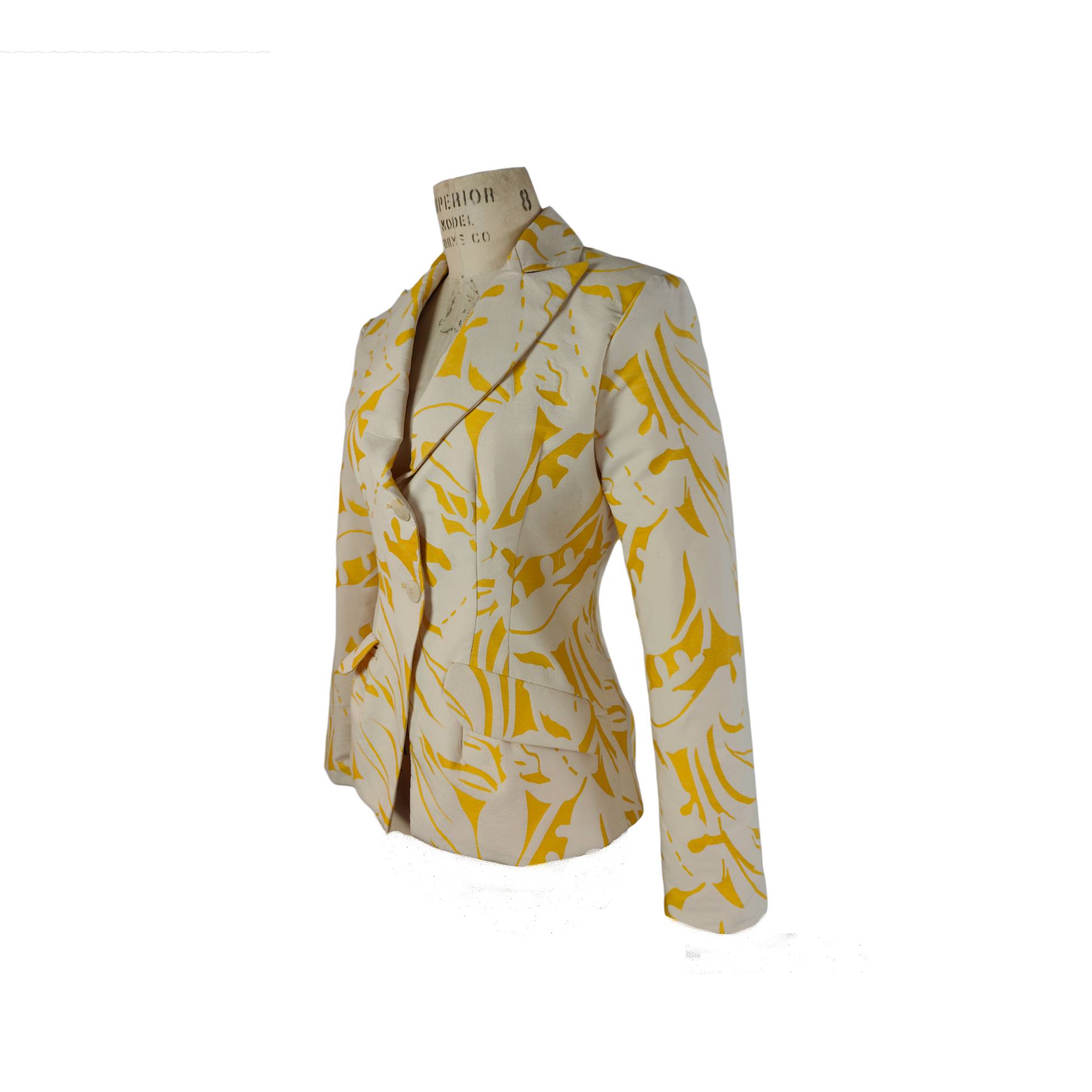 Side of slim fit blazer with a two button closure in beige with yellow patterns