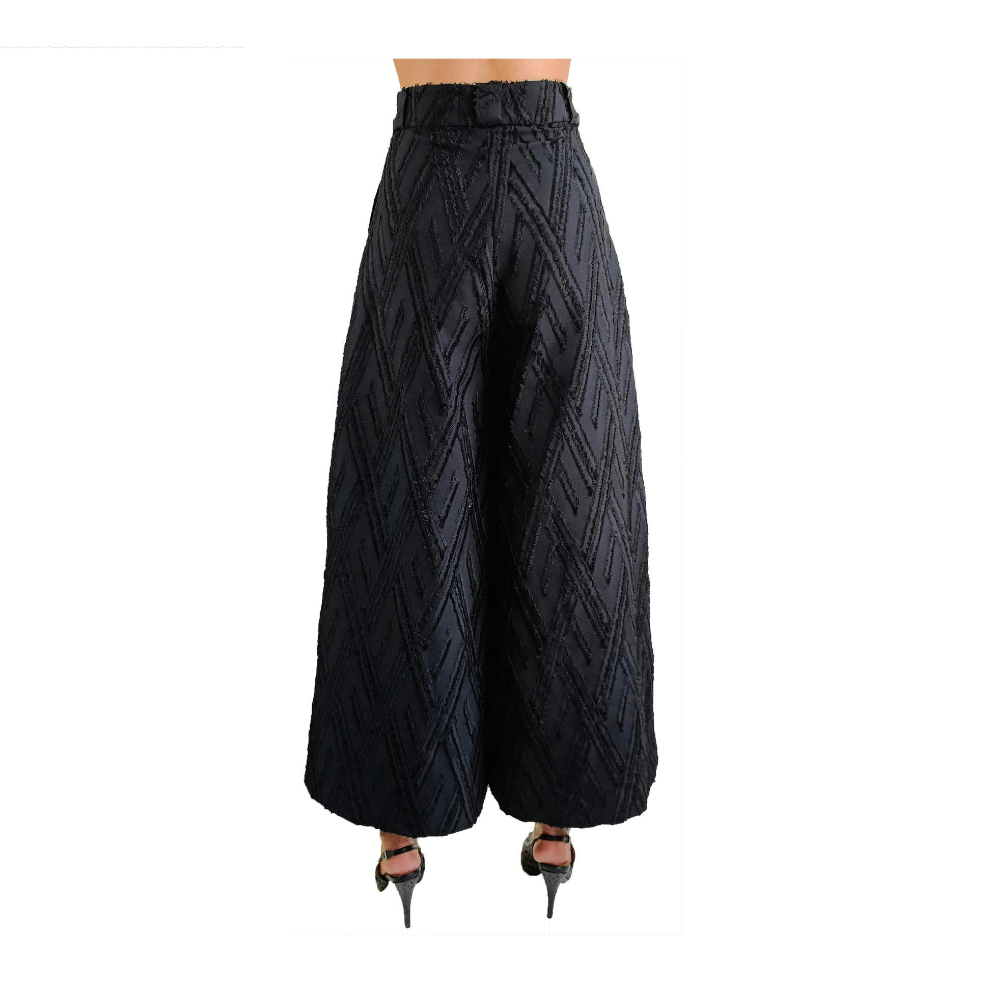 Back of black wide legged wool pants with frayed herringbone detailing