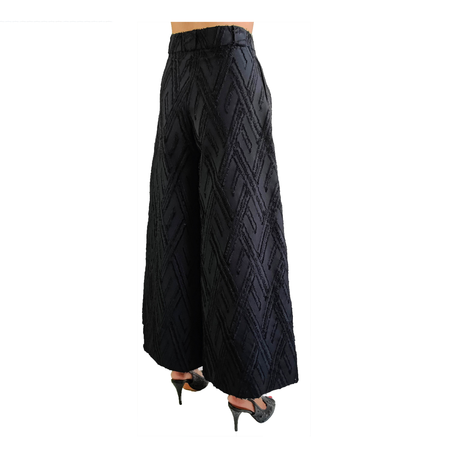 Side of black wide legged wool pants with frayed herringbone detailing