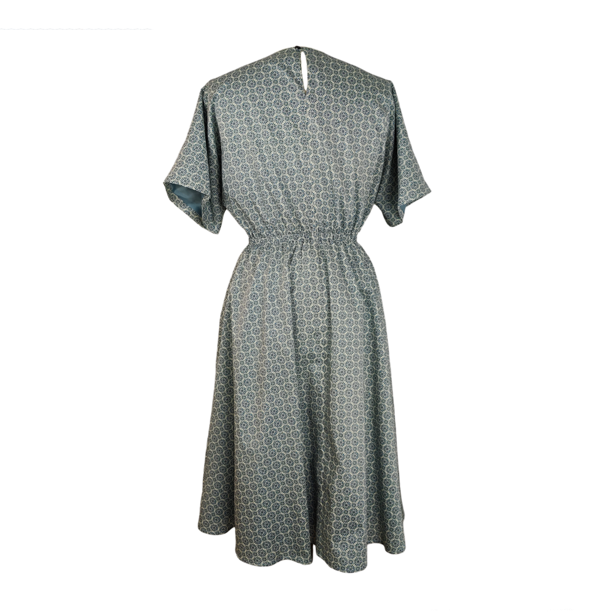 Back of blue pattern midi dress with drawstring detail, adjustable sleeves, and gathered waist