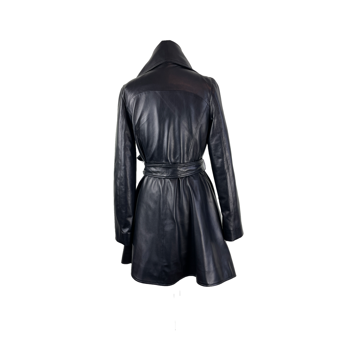 Back of sculptural black lamb skin coat with asymmetric closure and hem line and integrated belt