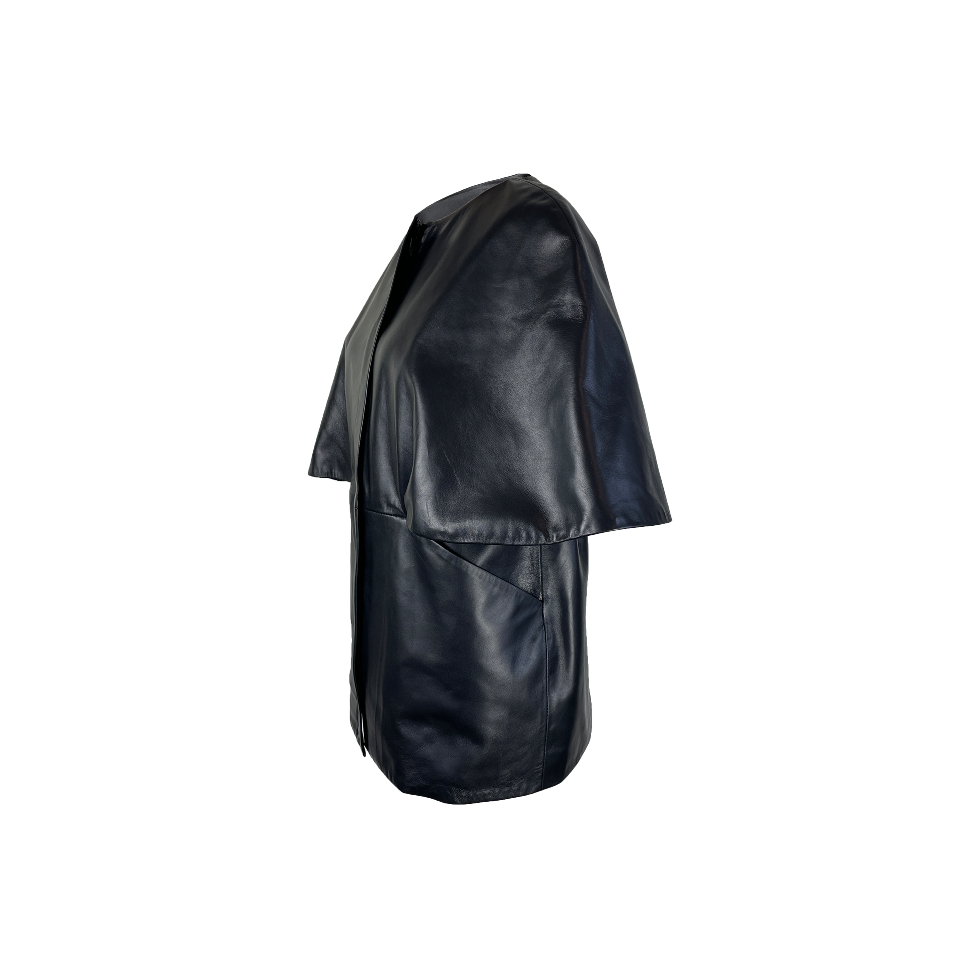 Side of Cape style black coat made of Italian twill tweed