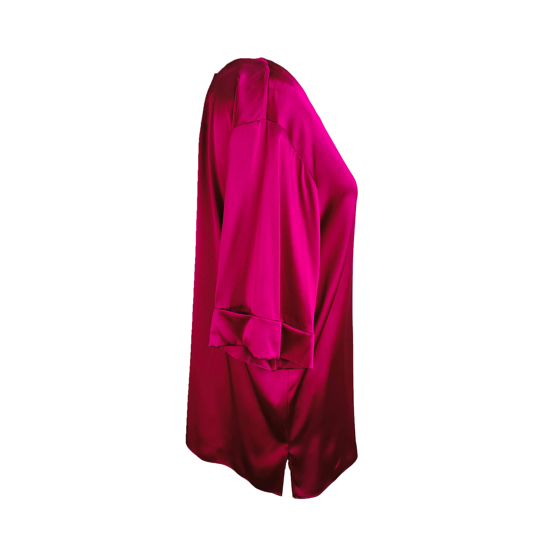 Side of long sheen fuchsia top with folded sleeves 