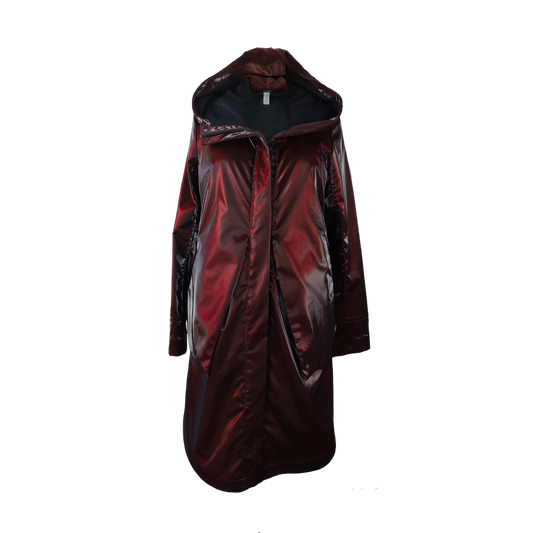 Lacquer burgundy rain coat made of water-repellant, metallic, and reflective fabric with an adjustable creating a peplum effect and an attached hood