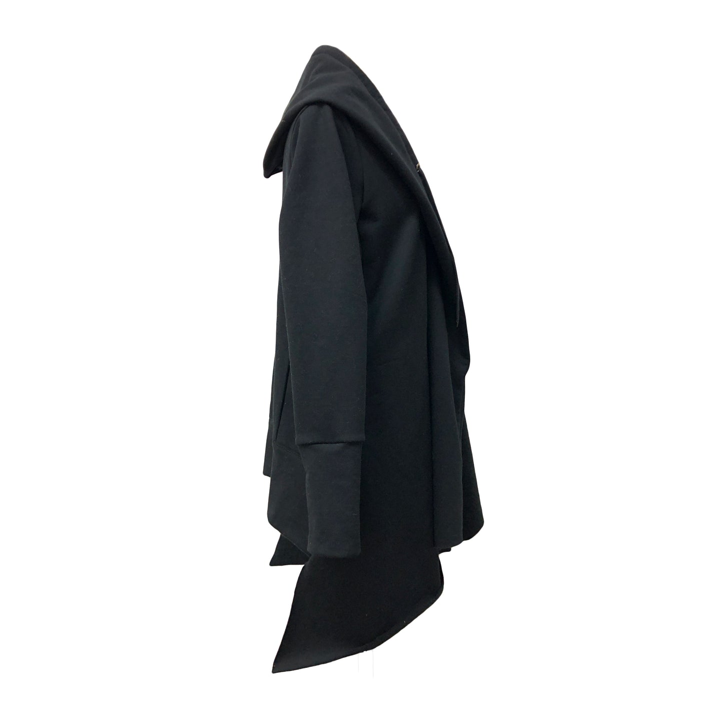 Side of loose black cardigan with adjustable shawl collar and fitted sleeves