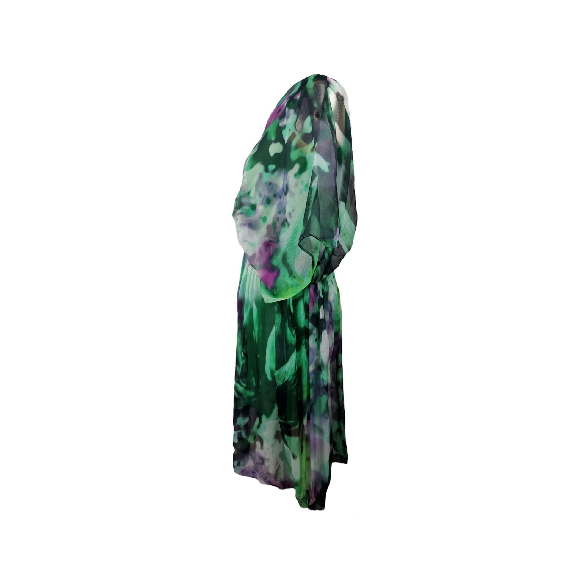 Side of abstract printed green loose fitted V neck dress with an integrated corset waist