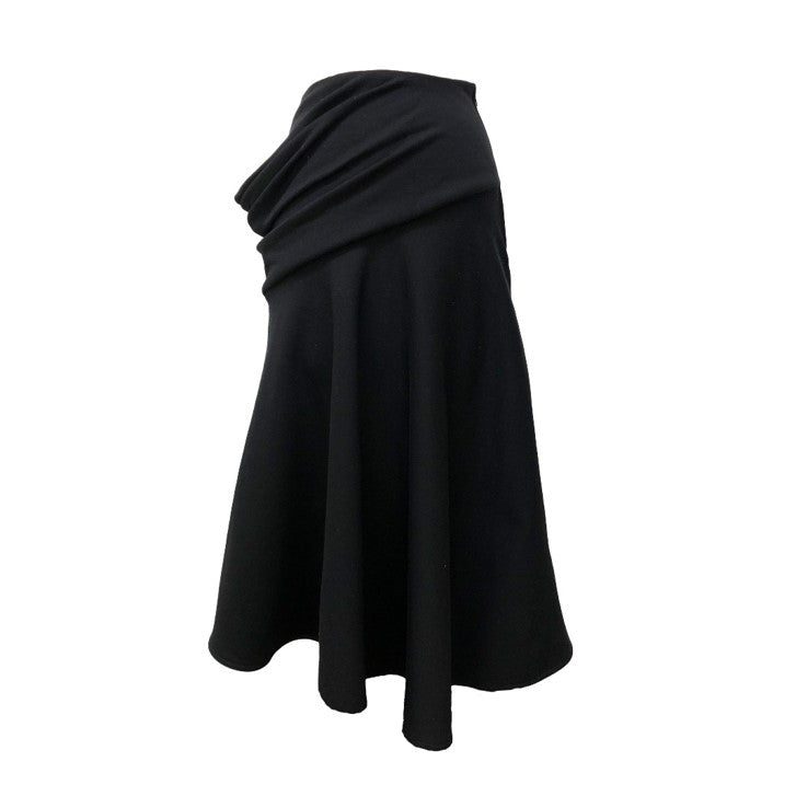 Side of black accentuating skirt with stylized cut made of cotton and lyocell