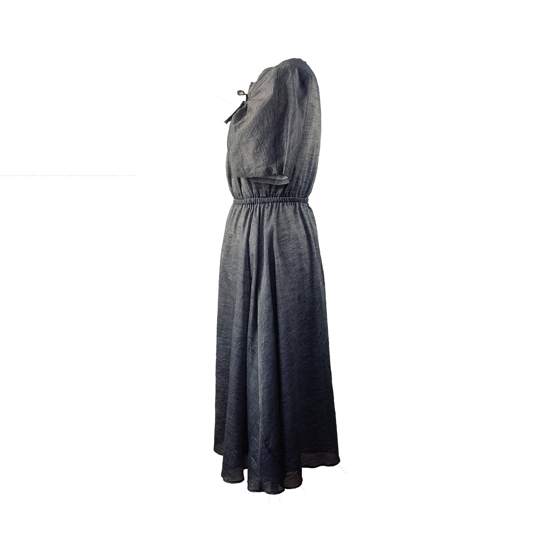 Side of denim blue midi dress with drawstring detail, adjustable sleeves, and gathered waist