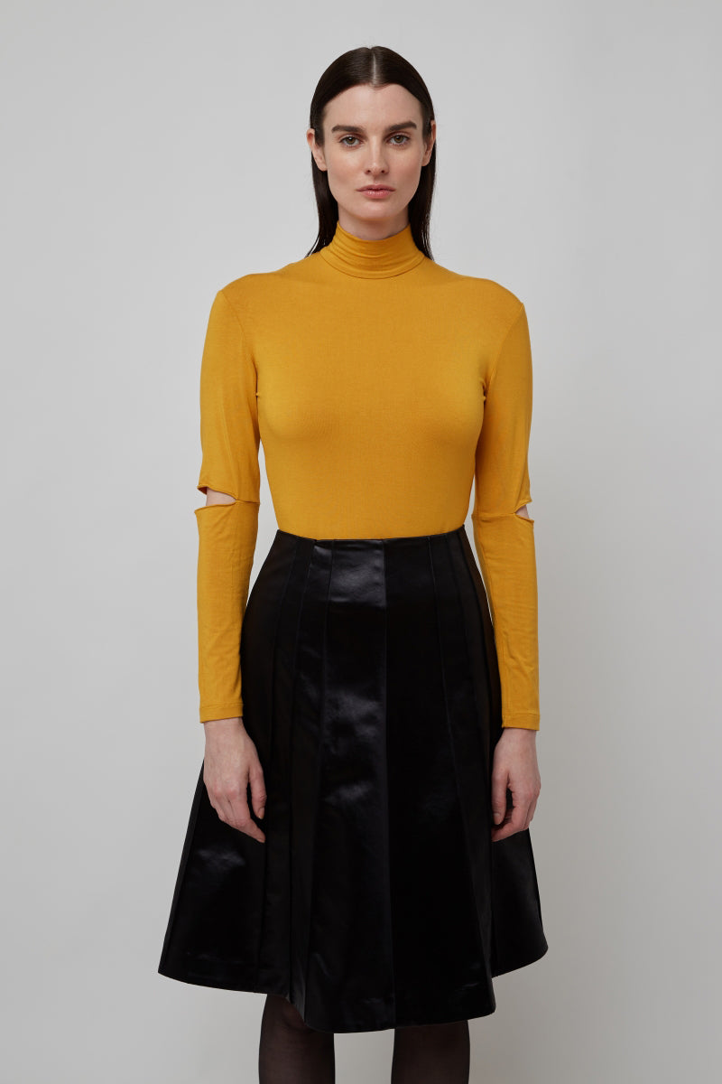 Black leather skirt and yellow top sales